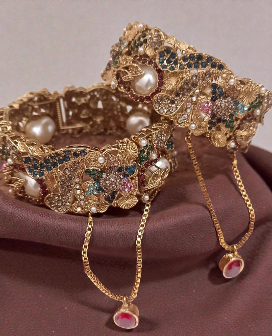 Exquisite Antique Gold Polki Bangles with Multicolor Stones, Pearls & Ruby Dangling Charms – Luxury Bridal & Party Wear