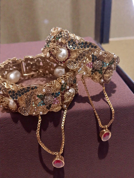 Exquisite Antique Gold Polki Bangles with Multicolor Stones, Pearls & Ruby Dangling Charms – Luxury Bridal & Party Wear